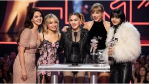 Taylor Swift and Madonna celebrating their major trophy wins at the 2026 MTV Video Music Awards