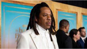 Jay-Z performing on stage before being announced for the 2027 Apple Music Super Bowl Halftime Show