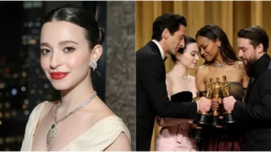 Mikey Madison wearing an elegant designer dress while holding her Academy Award trophy for Best Actress